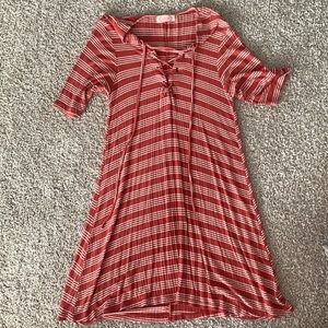 Orange and white stripe dress with cross cross tie on chest